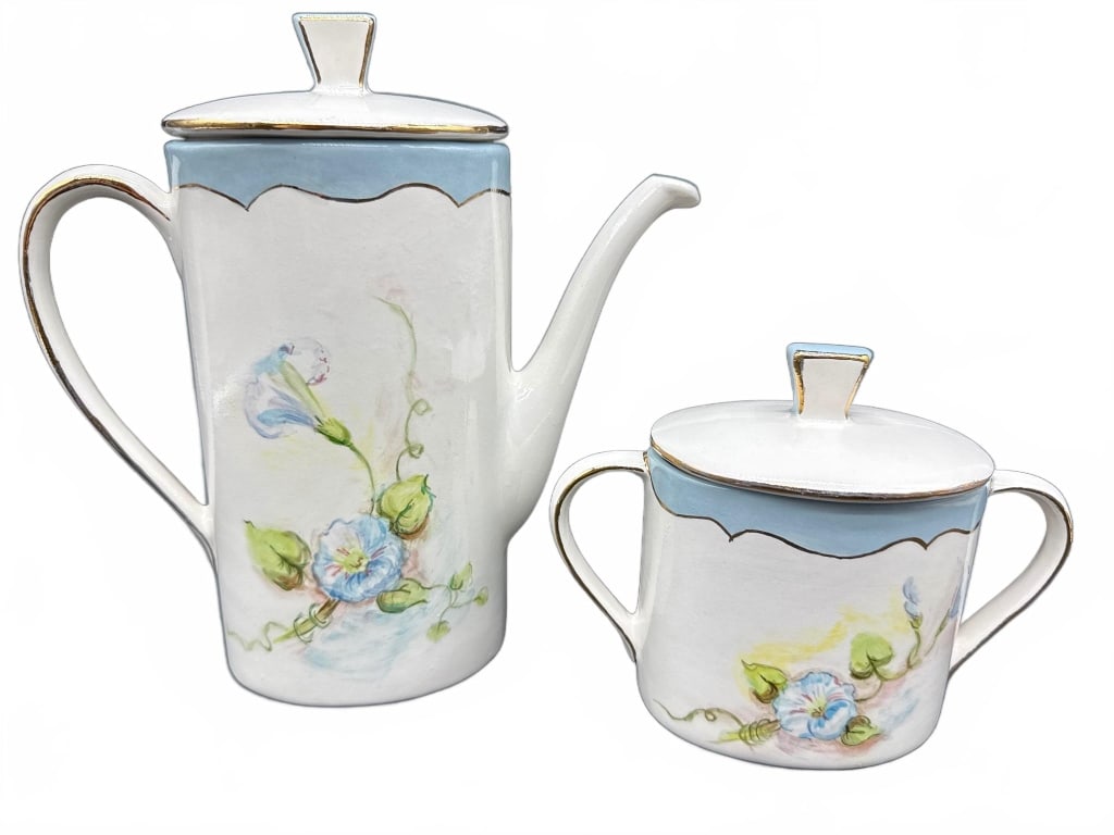 Hand Painted Porcelain Pot and Sugar Set: Porcelain coffee or tea pot and sugar bowl set, both hand painted with blue floral designs and gold trim. Both pieces feature "PB" monogram and are marked "Hand Painted Gold 24K" on the base. The pot 