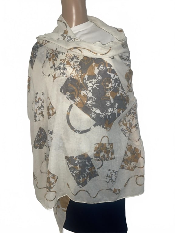 HERMES INSPIRED SCARF: Lightweight scarf wrap inspired by Hermes, featuring a print of Kelly bags in brown and gray on an off-white background. Measures 70" x 34" and is designed for versatile styling as a wrap or scarf.