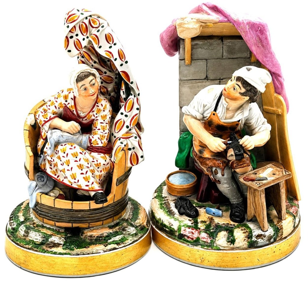 NIDERVILLER STYLE PORCELAIN FIGURINES PAIR 9": This matching pair of Niderviller style hard-paste porcelain figurines, Le Savetier et La Ravaudeuse (The Cobbler and The Seamstress), is modeled after designs by renowned French sculptor Paul Louis C