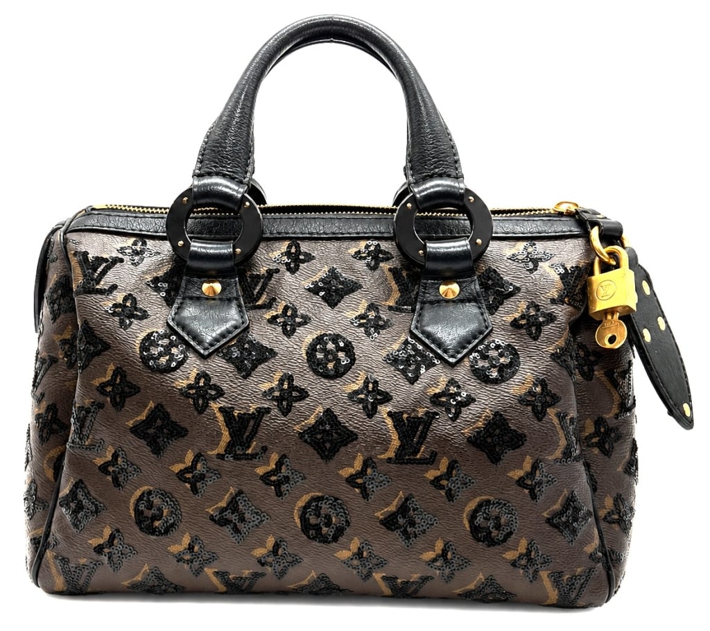 LOUIS VUITTON LIMITED EDITION SEQUIN SPEEDY 30 12": Exceedinly rare Louis Vuitton Limited Edition Monogram Sequin Eclipse Speedy 30 handbag from the Fall/Winter 2009-2010 Collection and designed during the celebrated Marc Jacobs era. This highly sought