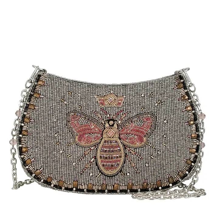 NEW MARY FRANCES CRYSTAL BEE BAG: Consider this your sign to add a little sparkle to everything. The Crystal Buzz purse is a hand-beaded silver stunner featuring an intricately detailed queen bee front and center, dripping in blush an