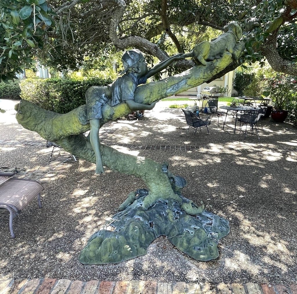 JIM DAVIDSON MONUMENTAL BRONZE GARDEN SCULPTURE 89: Monumental outdoor bronze garden sculpture attributed to Jim Davidson, featuring a dramatic naturalistic tree form with verdigris patina, climbing children, and playful animal details around the base.
