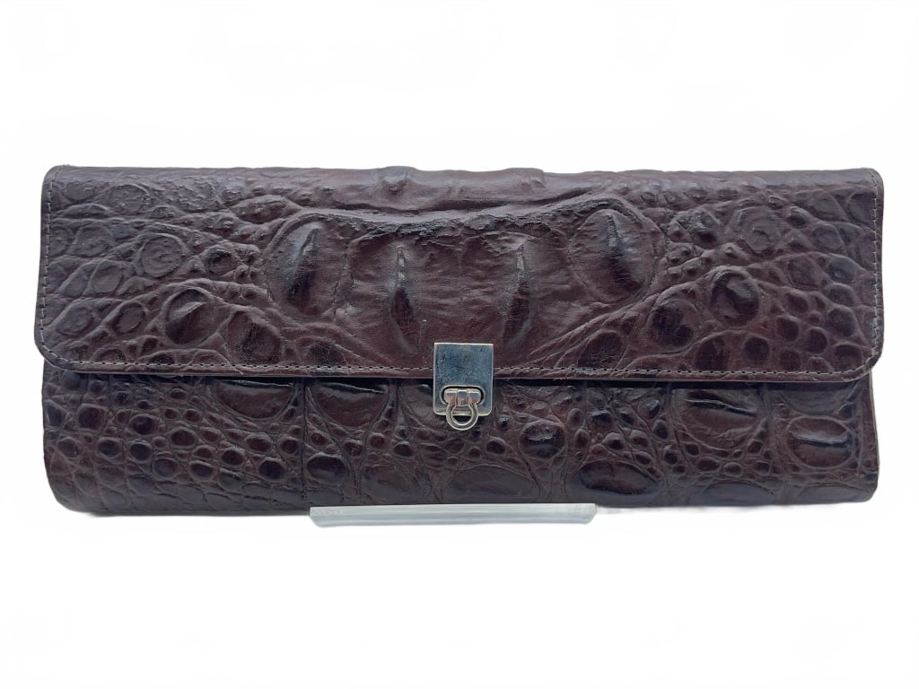 VEARI GENUINE CROCODILE LEATHER BAG: Veari clutch purse made from genuine crocodile leather, featuring a brown textured exterior and silver-tone clasp. Interior has fabric lining and zip pocket. Measurements shown in images for size refe