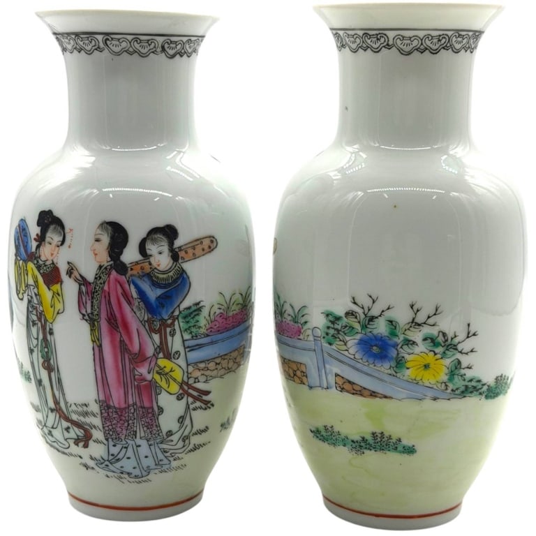 JAPANESE PORCELAIN VASES 8": This matching pair of vintage Japanese export porcelain vases features hand-painted decoration depicting elegant court figures in a traditional garden landscape with floral borders, scholar's rocks, a