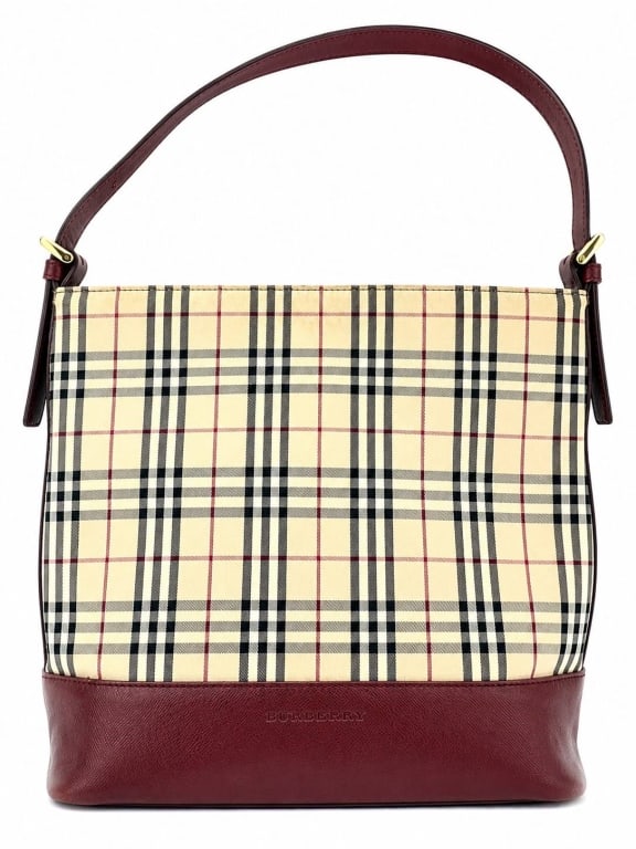 BURBERRY NOVA CHECK SHOULDER BAG 12": This Burberry shoulder bag features the iconic Nova Check canvas paired with rich burgundy leather trim and an adjustable leather shoulder strap. The streamlined silhouette is finished with gold-tone 