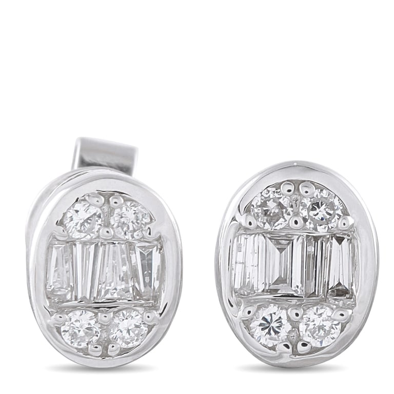 14K GOLD 0.40CT DIAMOND CLUSTER OVAL EARRING: An oval-shaped setting makes these luxury earrings a timeless addition to any jewelry collection. Sleek and elegant, they come to life thanks to a sparkling array of Diamonds totaling 0.40 carats. Eac