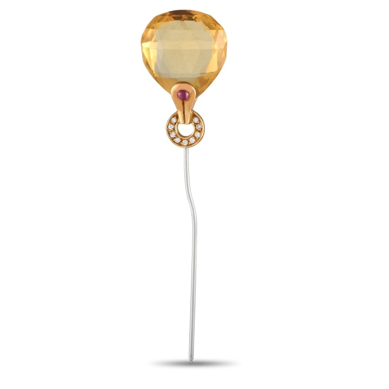 ANTONINI 18K YELLOW GOLD GEMSTONE PIN: A delightful, wonderfully-cut citrine stone takes the central spot of this enchanting pin from Antonini, set on a delicate 18K yellow gold base embellished with diamonds and a strikingly contrasting