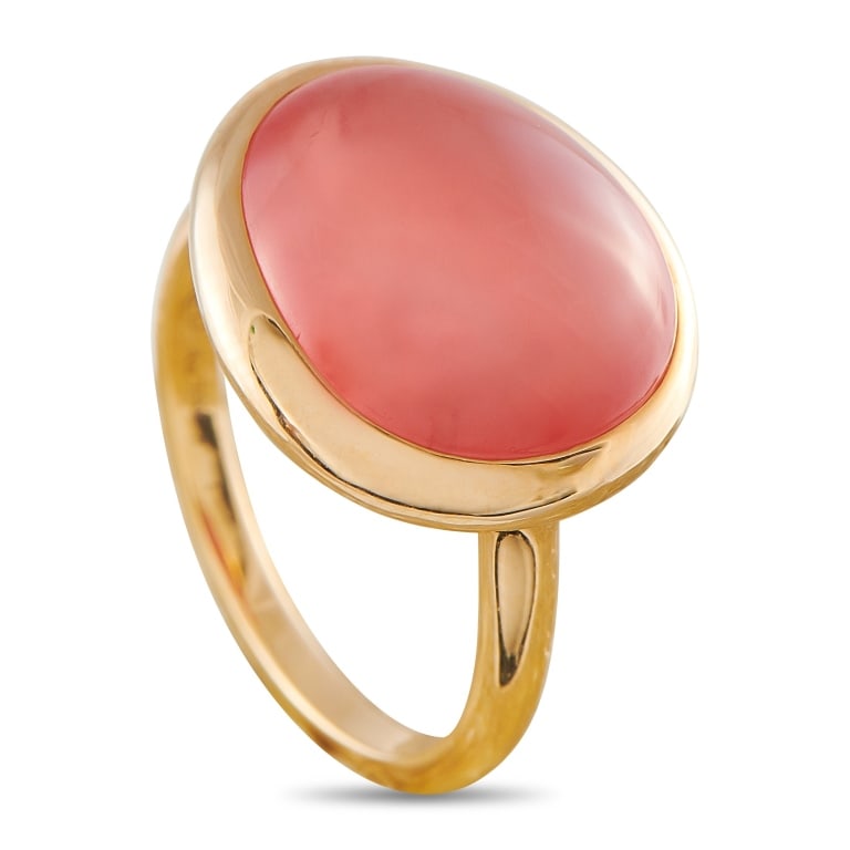 FRED OF PARIS BELLES RIVES 18K ROSE GOLD RHODOCHRO: Sleek and sophisticated, this Fred of Paris Belles Rives Rhodochrosite ring will add a pop of color to any ensemble. It includes a minimalist 18K Rose Gold setting with a 1mm wide band and a top heigh