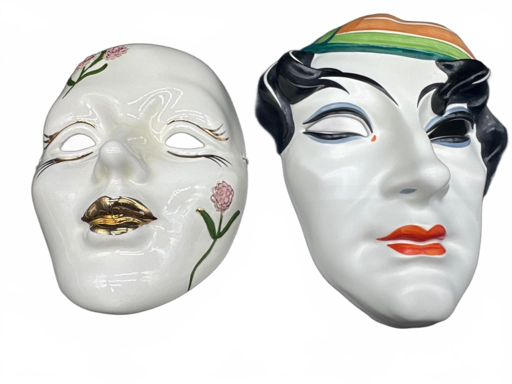 Hand-Painted Porcelain Masks: Two hand-painted porcelain wall masks. One features gold-tone lips and floral accents, the other has multicolored detailing with stylized facial features. Both marked, one 'Czechoslovakia Hand Painted