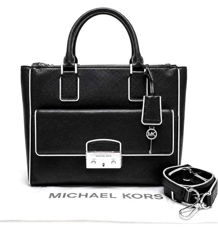 MICHAEL KORS AUDREY LARGE SATCHEL 14": This new with tags Michael Kors Audrey Large Satchel is crafted in black pebbled leather with contrasting white edge piping and polished silver-tone hardware. The structured silhouette features dual r