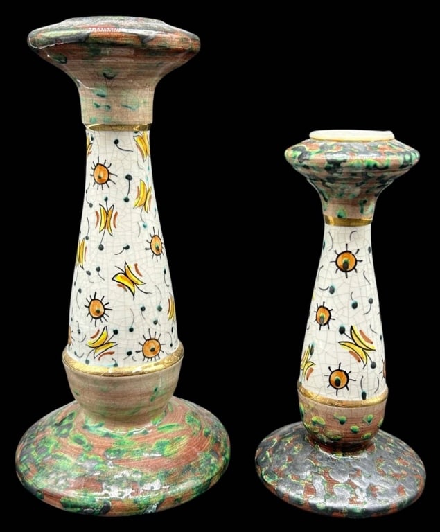 ART POTTERY HAND-PAINTED CANDLESTICK 10": Decorative hand-painted art pottery candlestick featuring a tapered form with a broad circular base and flared candle cup. The body is decorated with whimsical floral and abstract motifs over a crackl