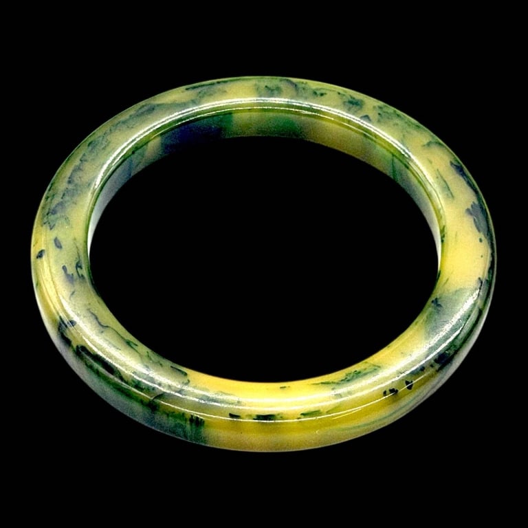 FAUX JADE GREEN MOTTLED BANGLE BRACELET 3": Classic vintage-style faux jade bangle bracelet featuring a polished translucent green body with attractive darker green mottled veining that closely resembles natural jade. The bracelet has a smooth 