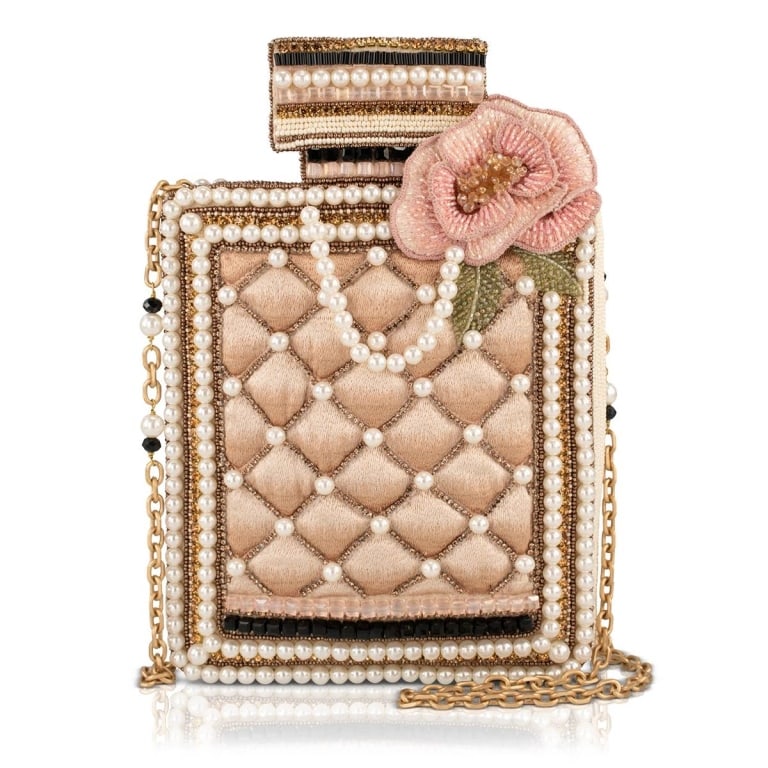 NEW MARY FRANCES PEARL ESSENCE BAG: Every Mary Frances piece is handmade! | | Some bags are accessories this one is a signature. The Pearl Essence crossbody purse is sculpted in the shape of a perfume bottle and layered in cascading pea
