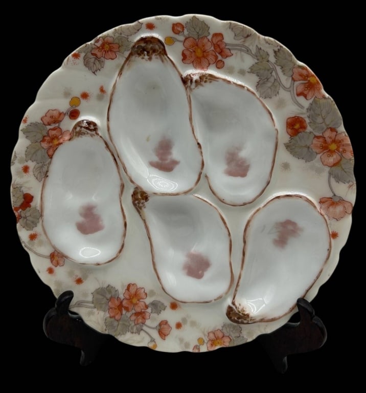 HAVILAND LIMOGES OYSTER PLATE 7.5": Beautiful antique Haviland & Co. Limoges France porcelain oyster plate featuring a delicate floral transfer decoration in warm coral, orange, and gray tones surrounding five molded oyster wells. The s