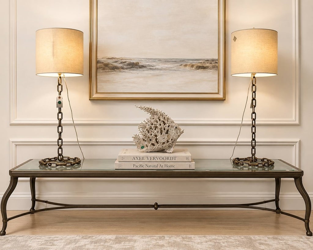 PAIR MODERN CHAIN TABLE LAMPS 34": Add sculptural style to your interior with this striking pair of contemporary chain-link table lamps. Each lamp features an industrial-inspired metal chain column rising from a matching circular chain