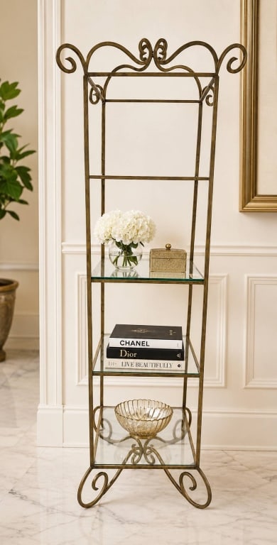 ORNATE METAL & GLASS DISPLAY ETAGERE 82": Bring elegant architectural style to any room with this decorative metal etagere featuring graceful scrollwork accents and three tempered glass display shelves. Finished in a warm antiqued bronze tone