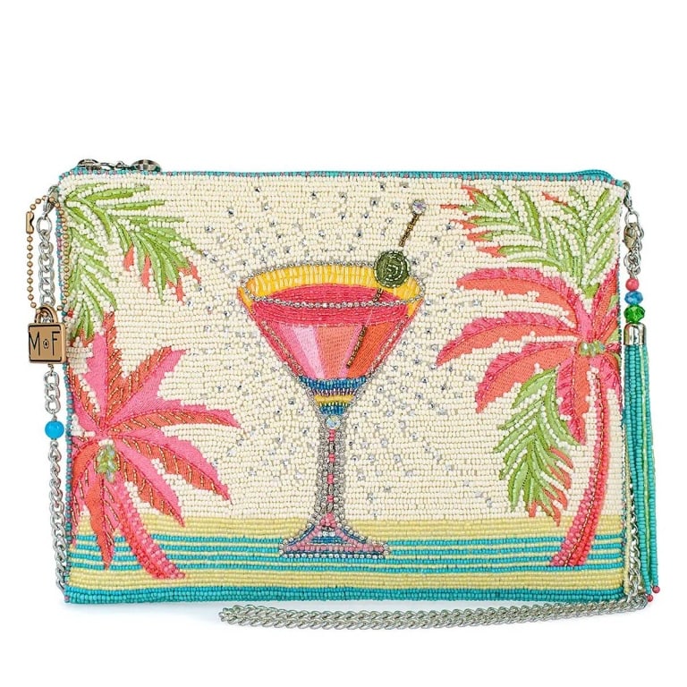 NEW MARY FRANCES PALM PARADISE BAG: Palm Paradise Handbag showcases a tropical-inspired design with bold palm fronds in striking tropical hues. The beaded craftsmanship highlights a mix of textures and colors. Finished with a tassel