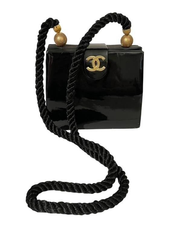 CHANEL BLACK BEAUTE COSMETIC PURSE BAG: - NOTE AS IS on this, a beaute gift from Chanel, frame has been well loved and doesn't close just right, some scuffing on the patent (pleather not leather) | - Chanel Beaute Paris tagged inside of bag