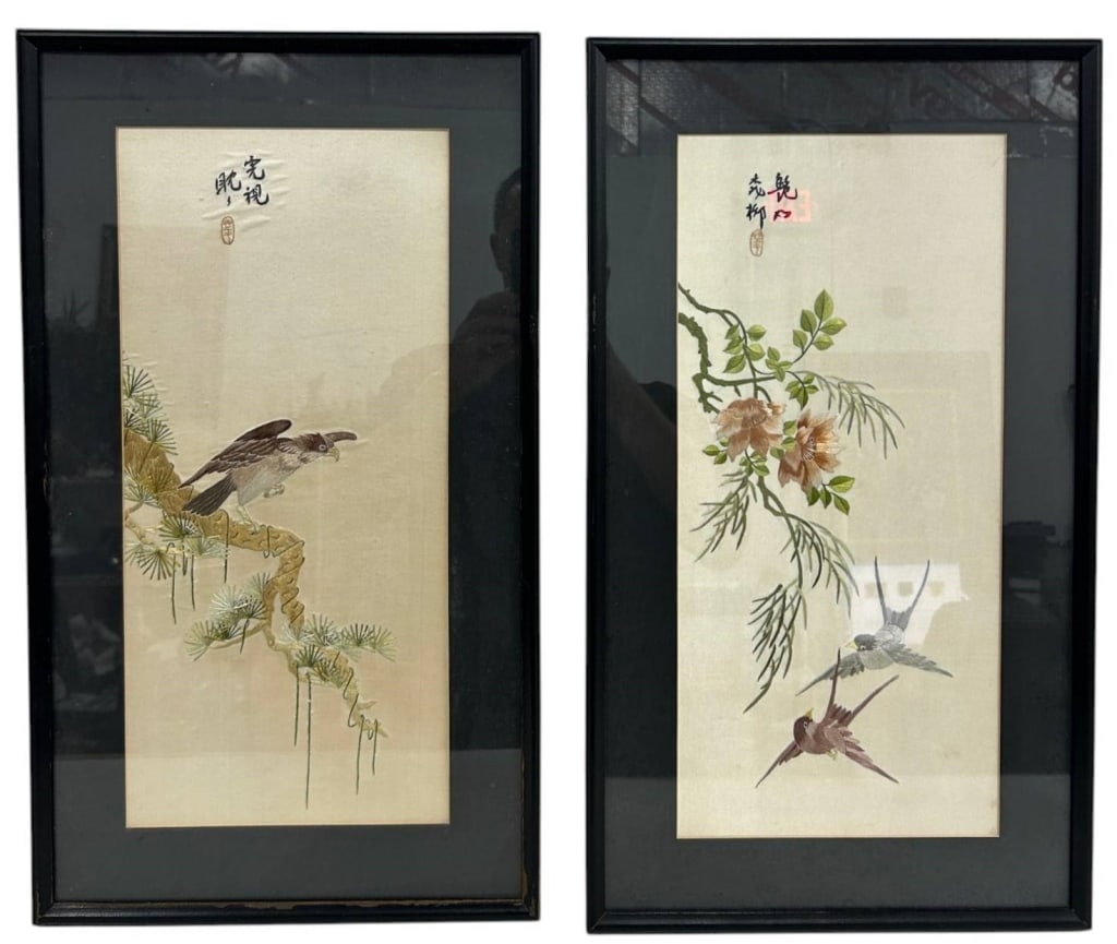 PAIR OF ORIENTAL BIRD & FLORAL SILK ARTWORK 22": This elegant pair of Oriental-style silk depicts finely rendered birds among flowering branches in a traditional composition accented with calligraphy and artist's seals. Executed in delicate natural 
