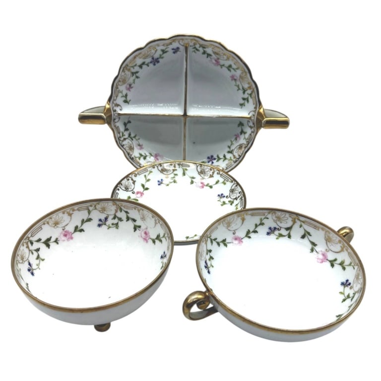 HAND PAINTED NIPPON 4PC SERVER SET 10": A four-piece hand-painted Nippon porcelain serving set comprising a divided relish dish with twin handles, two matching handled bowls, and a coordinating underplate. Each piece is decorated with delic