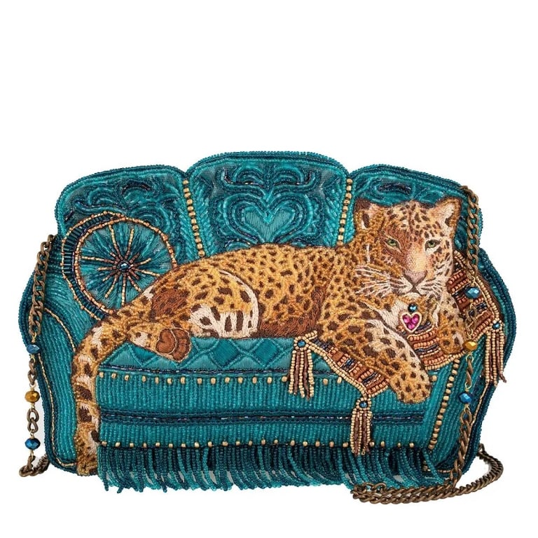 NEW MARY FRANCES LAZY LEOPARD BAG: Every Mary Frances piece is handmade! | | The Lazy Leopard crossbody features a gorgeously detailed leopard draped across a teal velvet beaded sofa like it owns the place, because some of us were simp