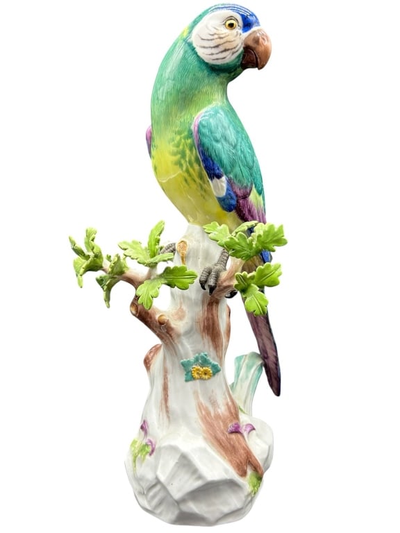 auction description Fri, Jul 17 at 10:31 AM please: MEISSEN PORCELAIN PARROT WITH CHERRIES 13in | | A finely modeled Meissen porcelain parrot figure depicting a colorful tropical bird perched upon a naturalistic tree trunk surrounded by sculpted cherry