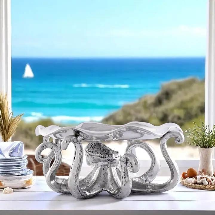 NEW ARTHUR COURTOCTOPUS COOKIE STAND: Description | Take a plunge into the oceanic charm of coastal d?cor with our one-of-a-kind Octopus Treat Stand. This intricately designed piece not only transforms your dessert table but also makes it