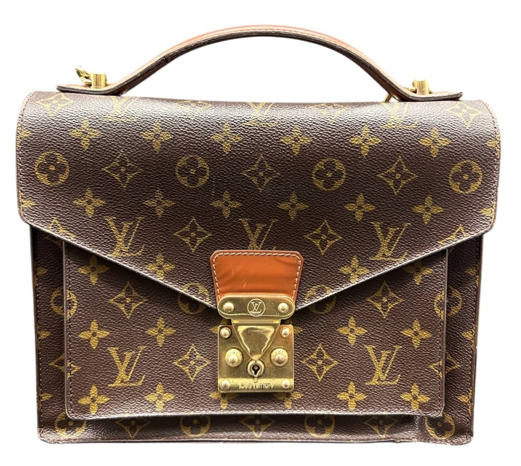 LOUIS VUITTON MONOGRAM MONCEAU BRIEFCASE 11": Authentic Louis Vuitton Monogram Monceau handbag/briefcase crafted in the iconic coated canvas with natural leather trim and polished gold-tone S-lock hardware. Features a structured silhouette with a