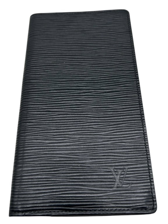 LOUIS VUITTON EPI BLACK LEATHER WALLET 7": Authentic Louis Vuitton black Epi leather long wallet crafted in France. This classic bifold design features the iconic textured Epi leather exterior with embossed Louis Vuitton initials and a black l