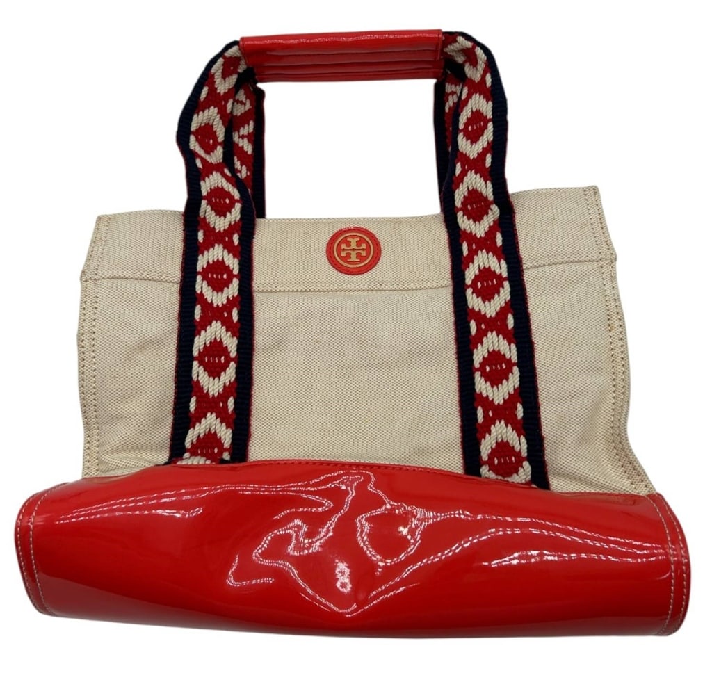 TORY BURCH CANVAS & PATENT LEATHER TOTE 13": Stylish Tory Burch canvas tote featuring natural beige canvas accented with vibrant red patent leather trim, coordinating woven red, ivory, and navy jacquard shoulder straps, and signature Tory Burch 