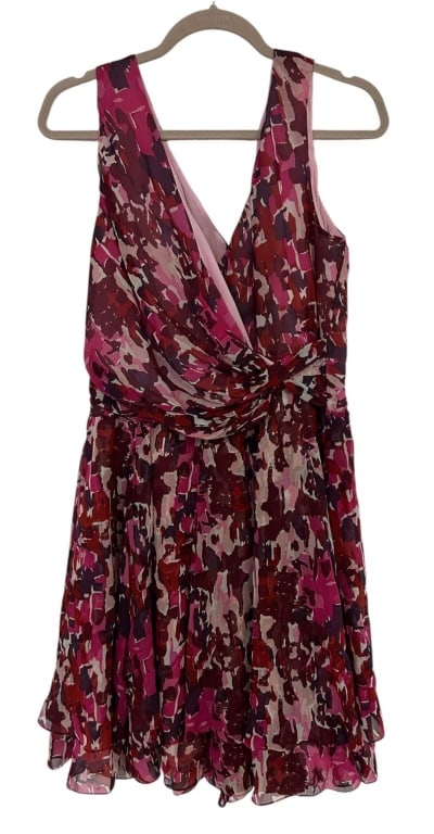 OSCAR DE LA RENTA SILK PRINT DRESS SIZE 12: Oscar de la Renta sleeveless silk dress crafted in Italy and featuring an abstract painterly print in rich shades of fuchsia, burgundy, plum, red, blush and ivory. Designed with a plunging V neckline,