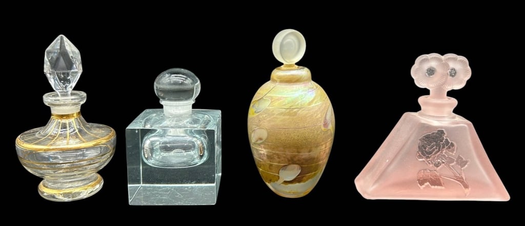 ART GLASS PERFUME BOTTLE COLLECTION 4": A charming collection of four decorative art glass perfume bottles showcasing a variety of handcrafted styles, colors, and finishes. This assortment includes a clear perfume bottle with elegant gilt d