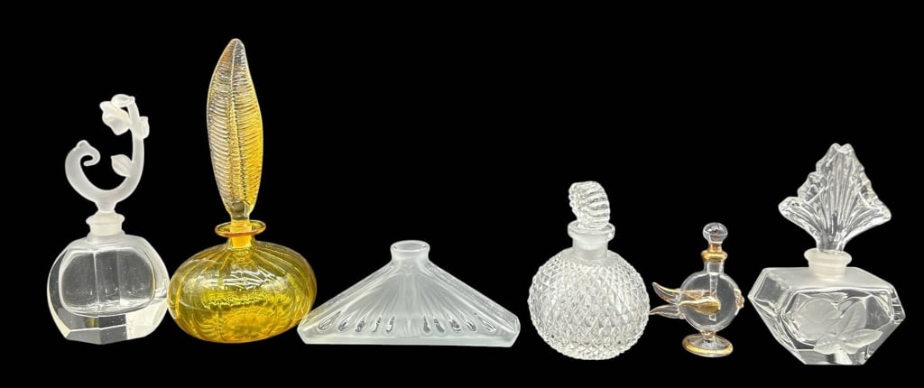 VINTAGE PERFUME BOTTLE COLLECTION 6": A charming assortment of six vintage decorative perfume bottles featuring an appealing mix of frosted, clear, and amber-toned art glass designs. The collection includes sculptural floral and leaf-form