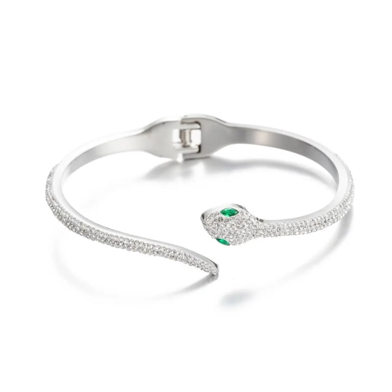 NEW EYE CANDY BIANCA SNAKE BRACELET: A snake can be one of the scariest creatures to man, but this silver bracelet proves otherwise. This cuff bracelet captures the elegance of the vicious reptile and gives it a charming new look. Green 