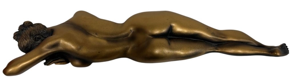 FEMALE BRONZE TONE COMPOSITE WALL SCULPTURE 25": A contemporary reclining female wall sculpture crafted from composite material with a bronze-tone finish. Designed to mount flat against the wall, this elegant figural sculpture features graceful anat