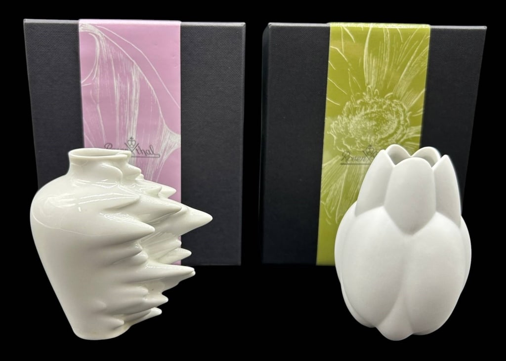 ROSENTHAL MINIATURE PORCELAIN VASE PAIR 4": Pair of Rosenthal white porcelain miniature bud vases, each featuring a distinct contemporary sculptural form. One vase has an organic faceted design, while the other features a stylized tulip-inspire