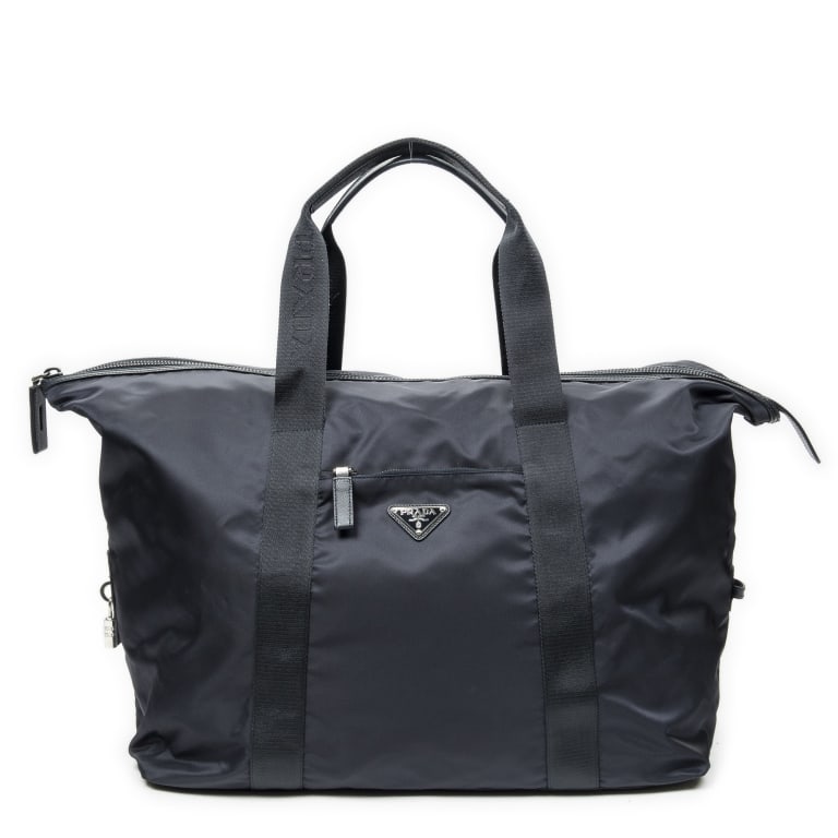 PRADA COLLAPSIBLE NAVY WEEKENDER: PRADA COLLAPSIBLE WEEKENDER NAVY NYLON CANVAS SILVER Dimensions (CM): 45*37*23cm Production Code: VA0796 AA ABD3747