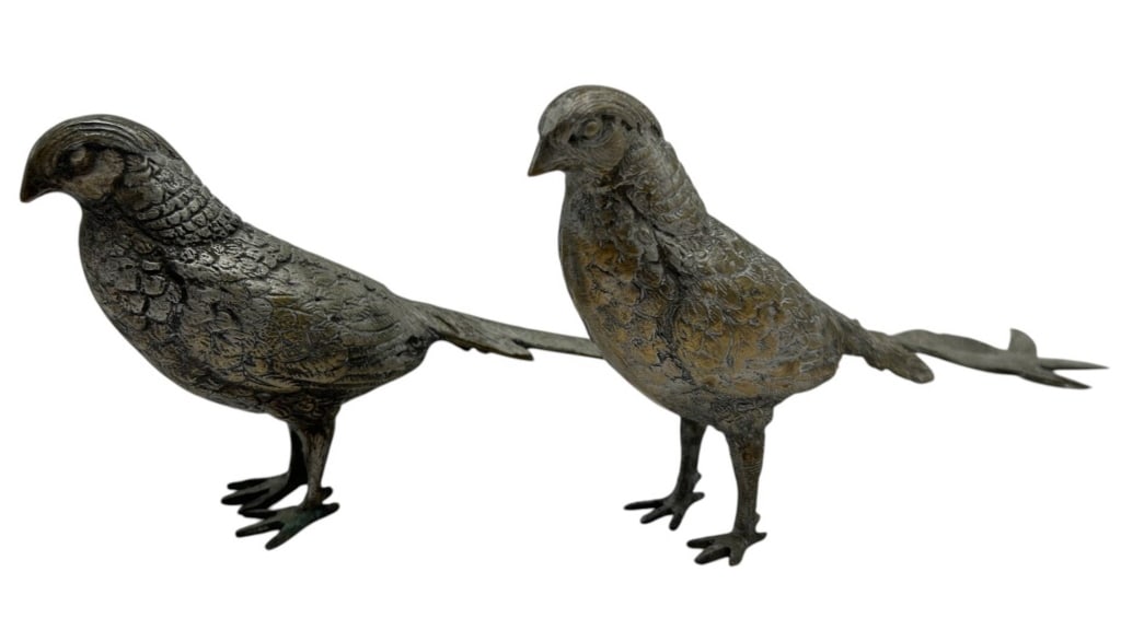 PAIR ANTIQUE METAL PHEASANT FIGURES 12": Decorative pair of antique-style cast metal pheasant sculptures, each modeled in a naturalistic standing pose with exceptionally long sweeping tail feathers. The birds feature detailed texturing throu