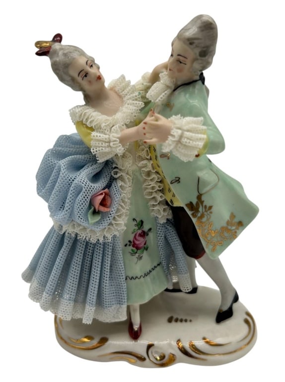 GERMAN PORCELAIN LACE COURTING COUPLE 4.5": Vintage German porcelain figural group depicting an elegantly dressed courting couple in an intimate dance or embrace. The lady wears an elaborate pale blue gown featuring extensive applied porcelain 