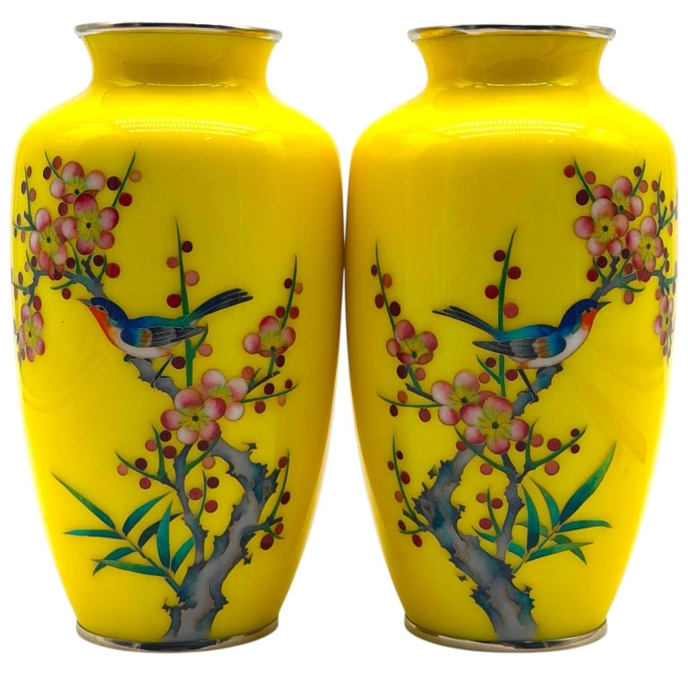 PAIR ASIAN CANARY YELLOW ENAMEL BIRD VASES 7": Elegant pair of vintage Asian enamel-on-metal vases featuring brilliant yellow grounds decorated with colorful songbirds perched among flowering plum or cherry blossom branches. Each baluster-form vas