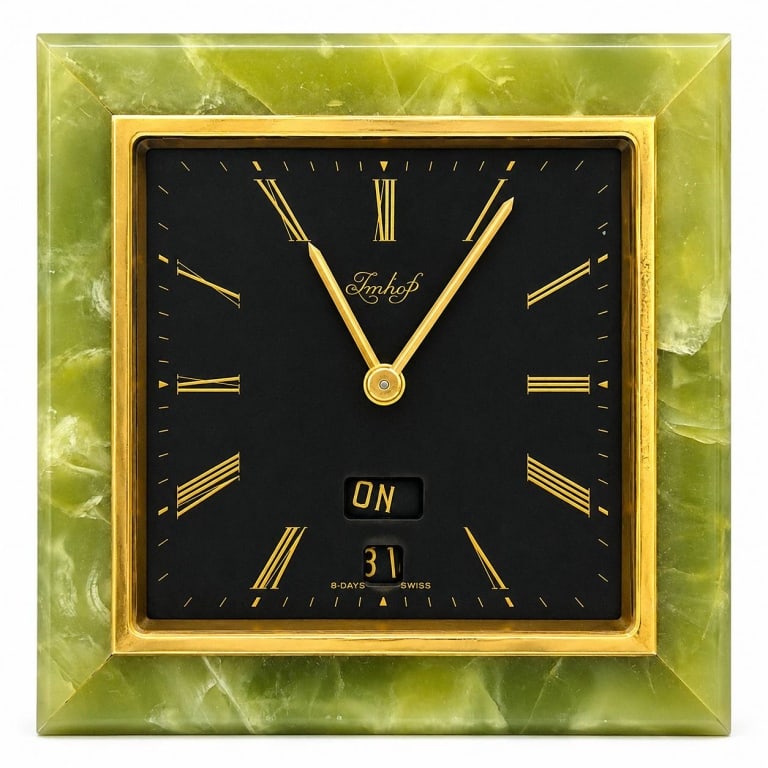 IMHOF SWISS MADE GREEN ONYX DESK CLOCK 4": Vintage Arthur Imhof Swiss 8-day mechanical desk clock set within a substantial polished green onyx case. Features a black square dial with gilt Roman numeral hour markers, gilt hands, day and date ap