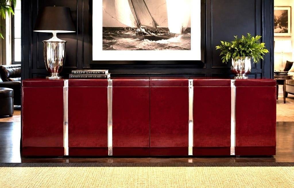 MODERN LACQUERED & CHROME BURGANDY SIDEBOARD 108": Contemporary sideboard featuring a high-gloss deep red lacquer finish with polished chrome accent bands. The cabinet offers multiple storage compartments with adjustable shelving concealed behind six 