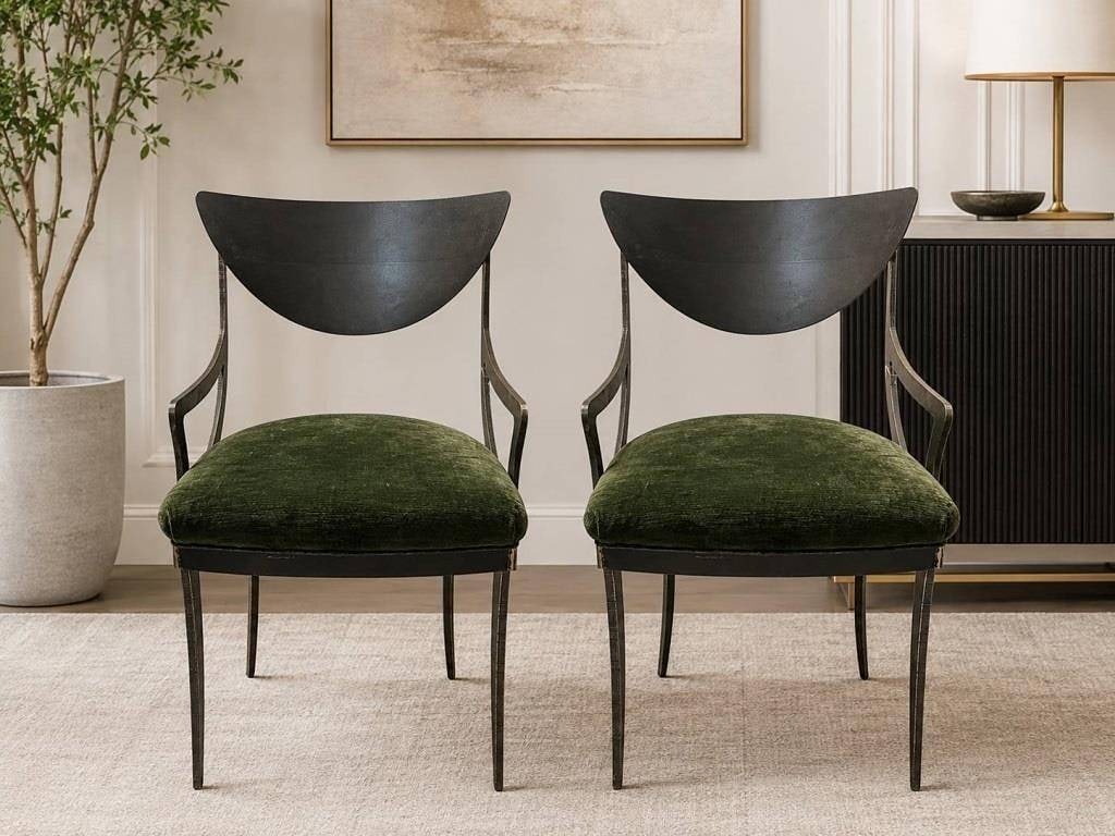 PAIR POSTMODERN IRON OPEN BACK CHAIRS 34.5": Chairs featuring iron frames and armrests. Each chair is finished with a green upholstered seat and an angular, curved back support. Distinctive design suitable for both functional and decorative use.