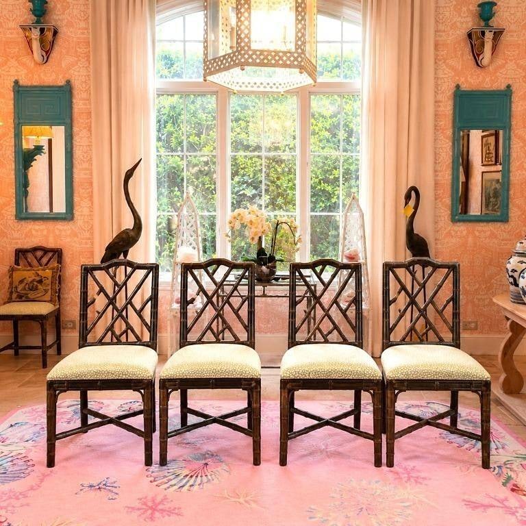 PALM BEACH REGENCY SET OF 4 BAMBOO- FORM CHAIRS: 4 bamboo-form dining chairs featuring dark grey faux bamboo frames with decorative lattice backs and upholstered seats in a ceylon green patterned fabric. The chairs offer a classic Palm Beach Regency