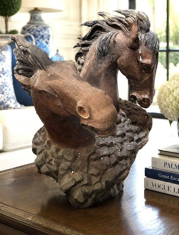RUNNING HORSES SCULPTURE 20": Decorative sculptural group depicting two spirited horse heads emerging from a naturalistic rocky base, each rendered with flowing windswept manes and expressive features that capture the energy and g