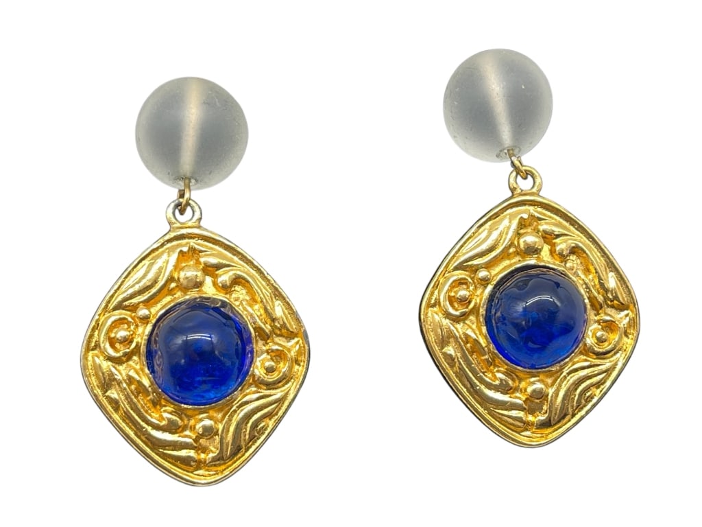 CHANEL GOLD & COBALT BLUE GRIPOIX-STYLE EARRINGS: Elevate your jewelry collection with this elegant pair of CHANEL gold-tone dangle earrings, featuring striking cobalt blue glass cabochon-style centers set within ornate gold-tone frames. Inspired by 