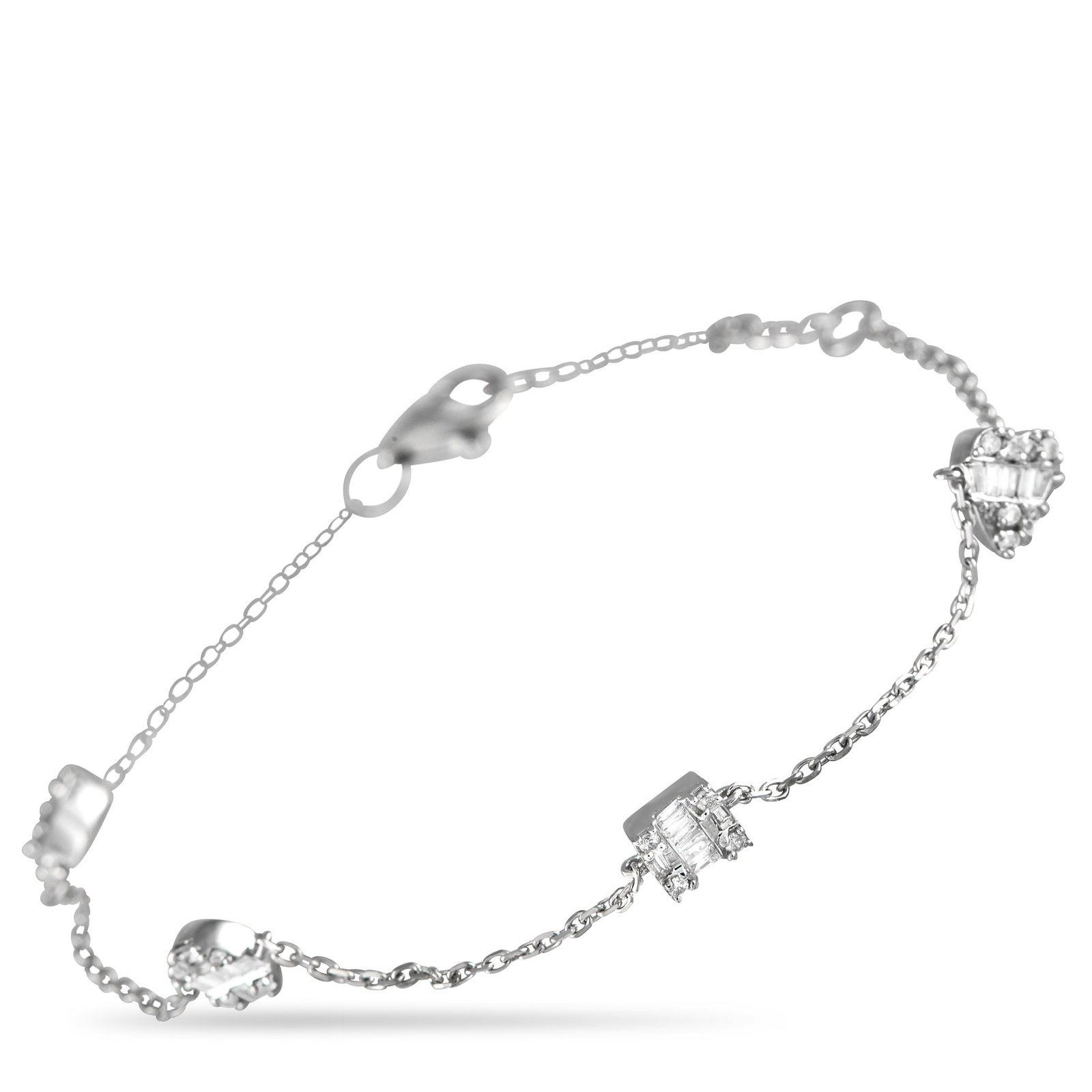 14K WHITE GOLD 0.25 CT DIAMOND STATION BRACELET: Worn solo or stacked, this diamond station bracelet is bound to become a staple in your jewelry rotation. It features a faceted link chain with evenly spaced diamond clusters along its length. This LB