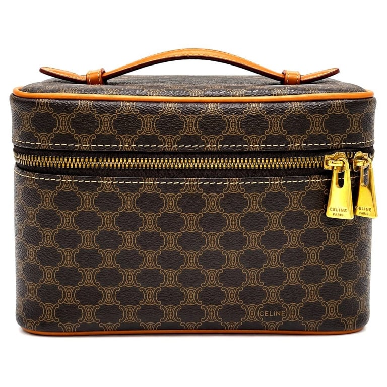 CELINE MACADAM VANITY CASE UNUSED 8": Vintage Celine Paris vanity case in exceptional condition, crafted in classic brown Macadam Triomphe monogram coated canvas with tan leather trim and gold-tone hardware. Structured case features a lea