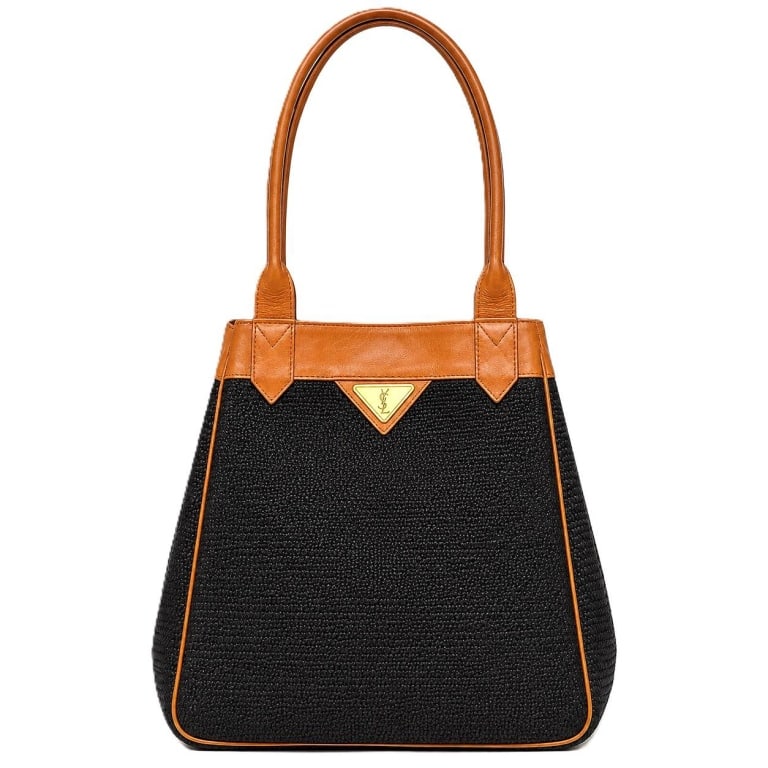 YSL VINTAGE BLACK & TAN SHOULDER TOTE 18": Vintage Yves Saint Laurent shoulder tote featuring a black woven textile body accented with tan leather trim, piping and elongated leather shoulder straps. The front is finished with a distinctive tri
