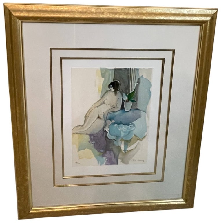 ITZCHAK TARKAY SIGNED LTD LITHOGRAPH 25": This limited edition lithograph by renowned Israeli artist Itzchak Tarkay depicts one of his iconic contemplative female figures rendered in his distinctive modern figurative style. Executed in soft w